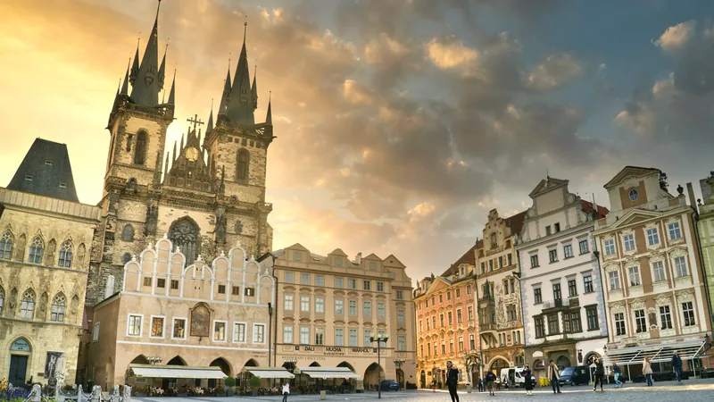 Prague's Old Town Square and the Church of Our Lady before Týn at golden hour