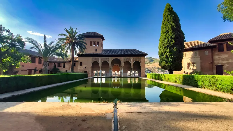 A courtyard and reflecting pool at the Alhambra in Granada
