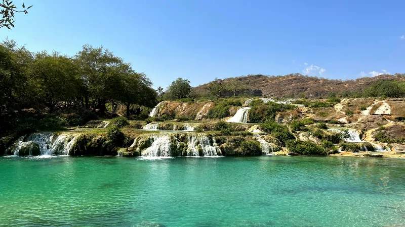 Turquoise pools and small cascades in an Omani wadi