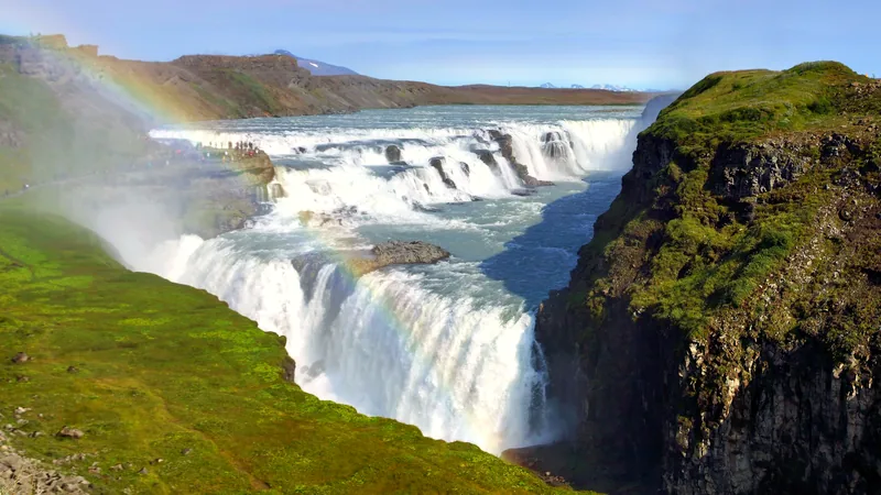 A rainbow over the tiered falls of Gullfoss