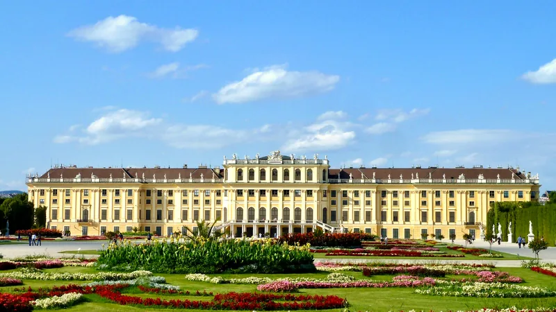 Schönbrunn Palace behind formal flower beds in summer